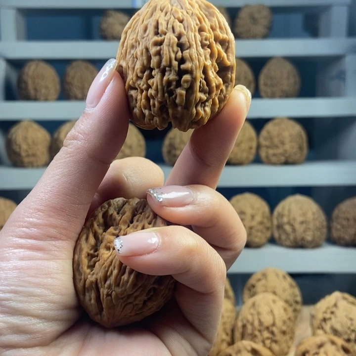 刚****文玩核桃吊坠正宗南疆石文玩核桃