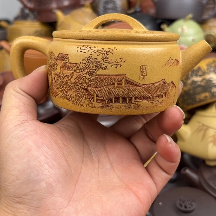 茶壶紫砂壶身跳砂底部花泥