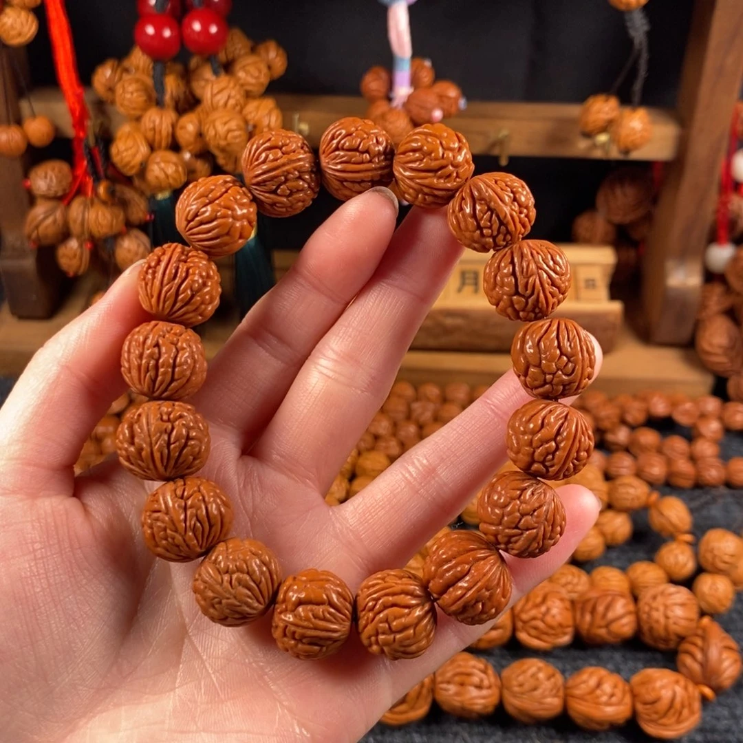 吊坠桃核13链接桃枭手串