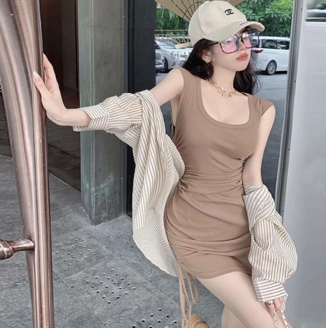 条纹防晒衬衫女夏季薄款宽松镂空设计感露背上衣+抽绳背心包臀裙