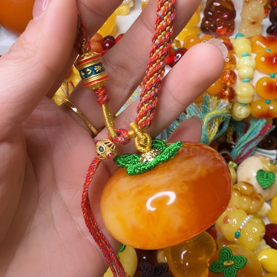 最***恰非金属蜜糖红柿子手把件