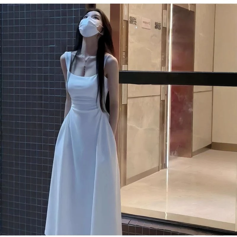 赠镜子法式茶歇白色吊带连衣裙女夏季新款小个子a字收腰小白长裙