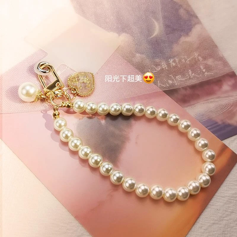 手机挂绳短款手腕挂链女款金箔爱心珍珠手工串珠挂件精致吊牌挂饰