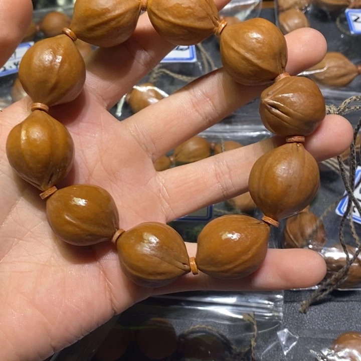 吕***淸吊坠橄榄核梅林铁核