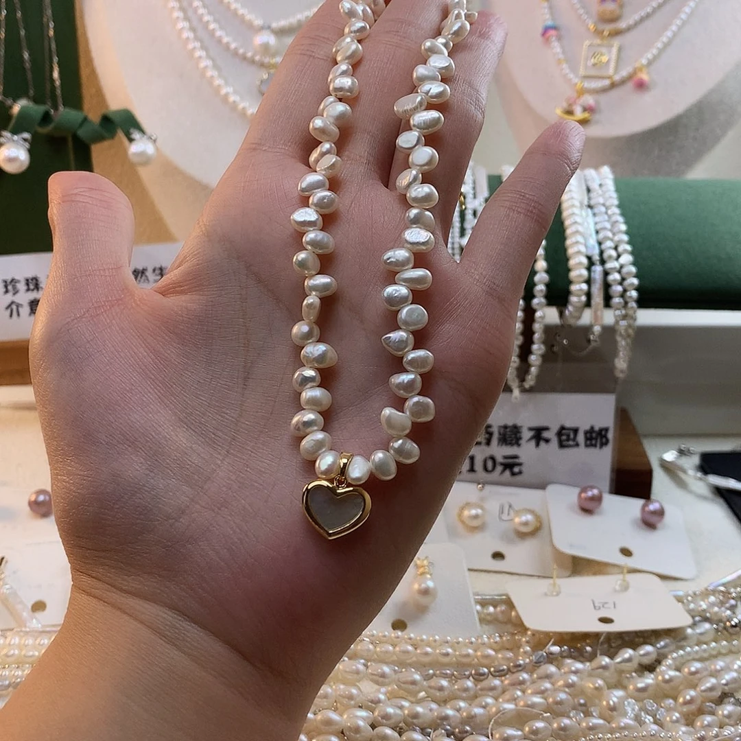 张***子合金淡水珍珠爱心项链