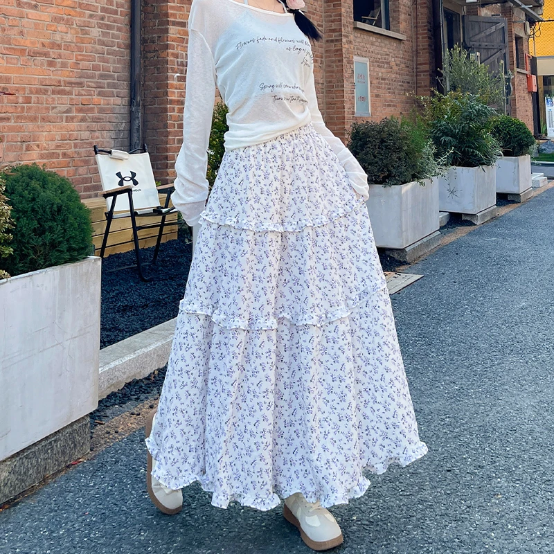 温柔风碎花半身裙女春秋夏2025新款高腰显黑色高腰不规则半身裙