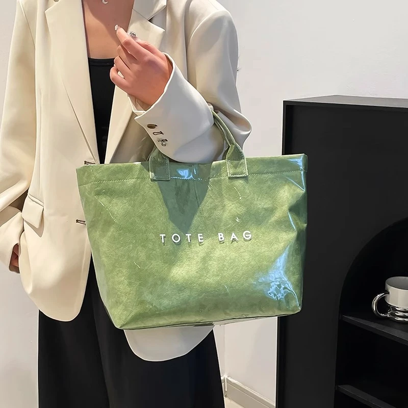 大容量牛皮纸果冻包2025新款透明防水手提袋上班通勤斜挎托特包包