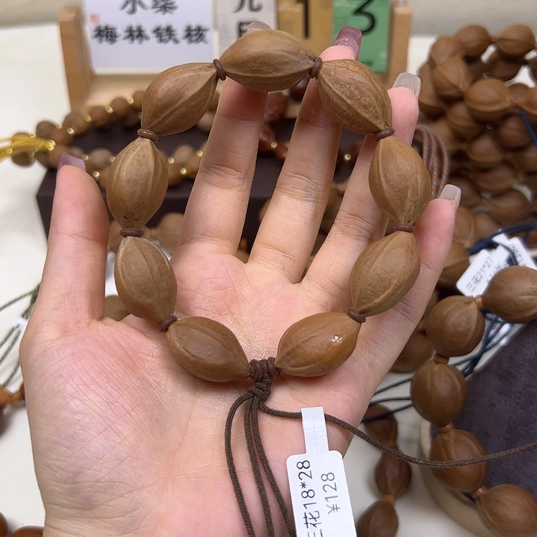 蓦***独手串/手链橄榄核三花18.28