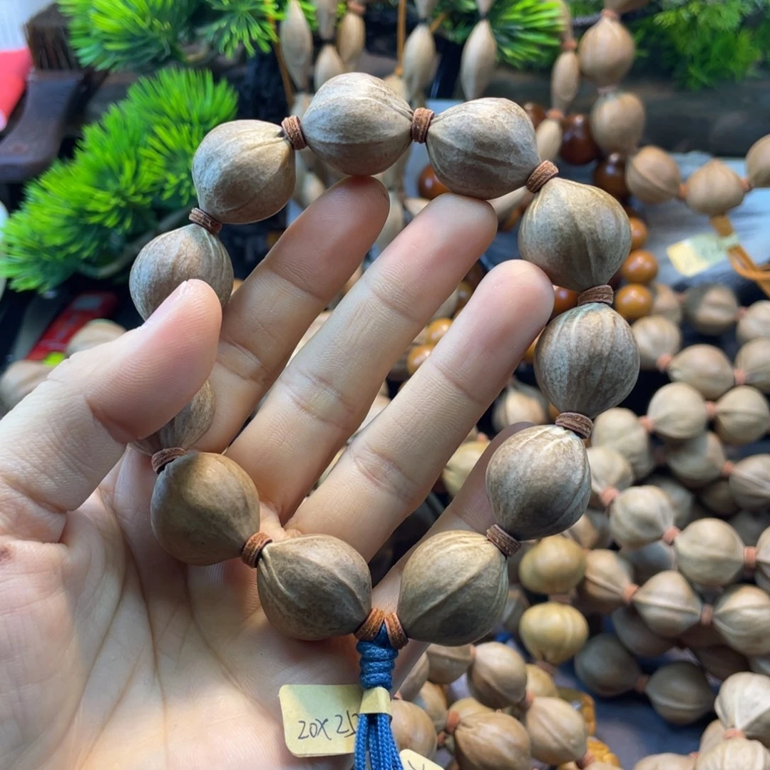 曾***戎吊坠橄榄核2025红核