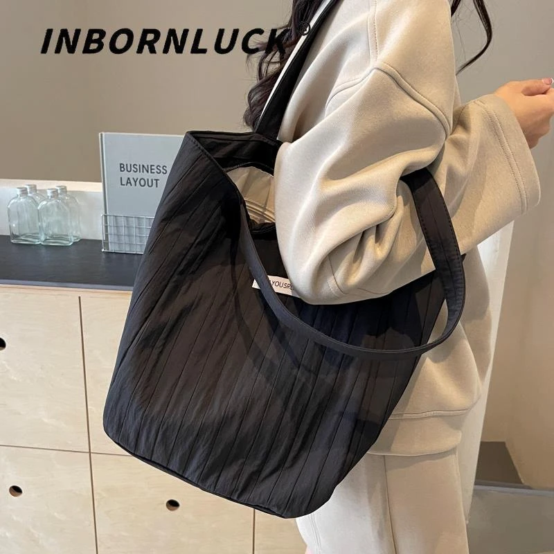 夏季大容量单肩包包女休闲褶皱帆布手提袋百搭学生上课通勤托特包