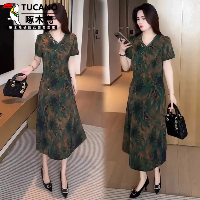 啄木鸟时尚印花连衣裙女士2025夏季新款时髦洋气收腰显瘦气质中长