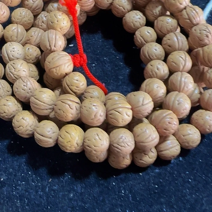 荪***野生1.0桃核盘锦黄桃脖挂