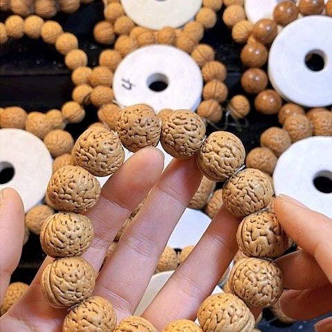 桃核吊坠追**生桃核手串