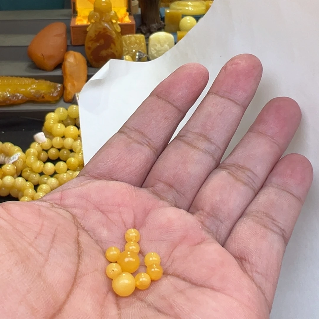 一***光蜜蜡未镶嵌珠宝奇石8个珠子