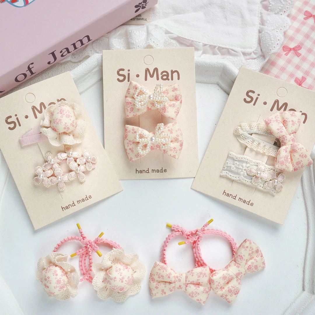 满9.9飞 初春日韩系儿童粉色爱心蝴蝶结甜美布艺碎花蕾丝手工发饰