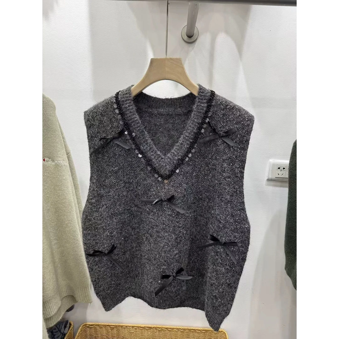 ［雪龙浩家］秋冬女士亮片蝴蝶结针织宽松短款马甲