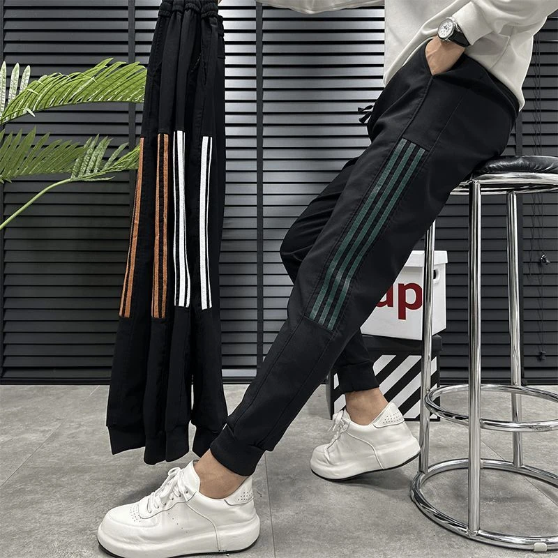 休闲裤男士青年新款条纹时尚潮流百搭松紧腰束脚哈伦运动裤男
