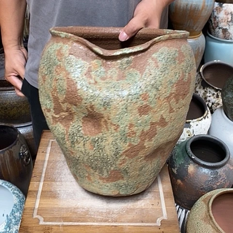 紫砂花盆口24告负31手拉
