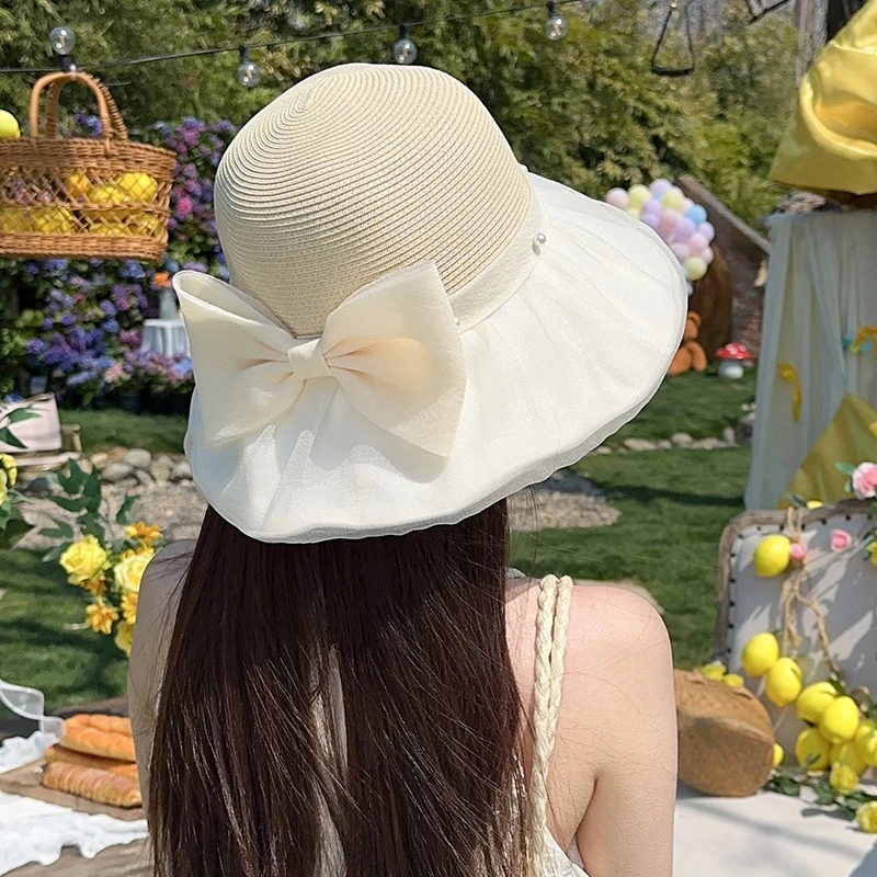 蝴蝶结珍珠大檐渔夫帽子女2025新款布草拼接春夏防紫外线优雅盆帽
