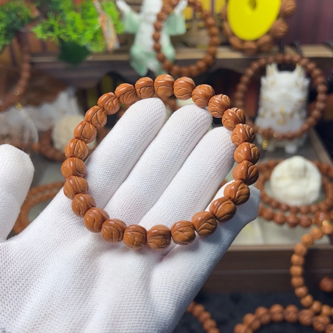 L****吊坠桃核玉龙脊手串10