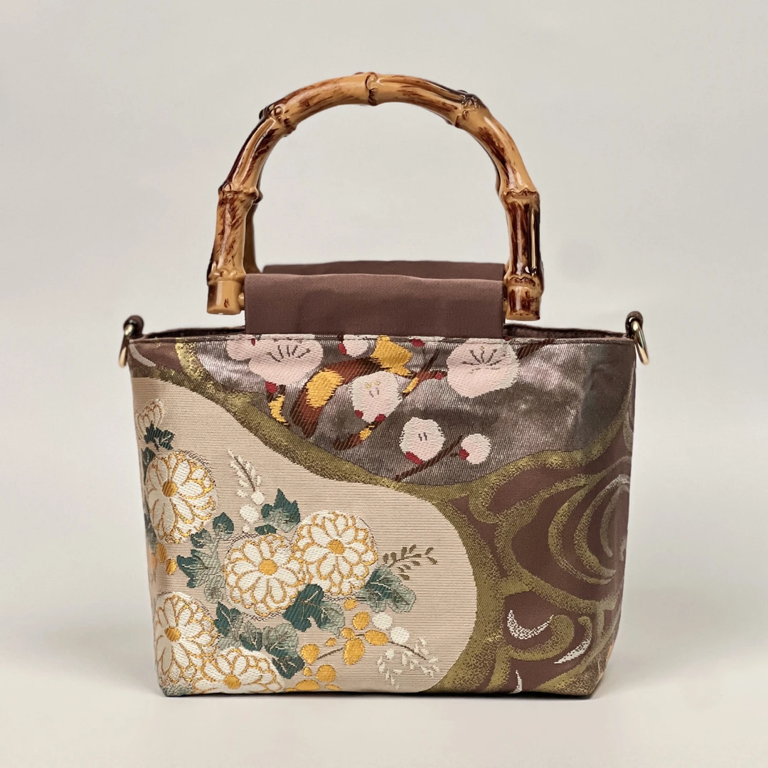 西阵织竹柄菜篮子手提包女包新中式斜挎包2025独特漂亮包雏菊包包