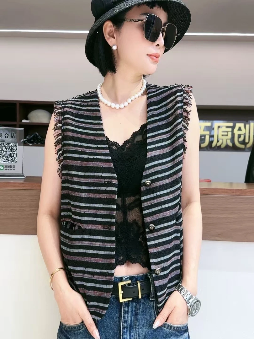 迷巧时尚新款通勤风民族风马甲修身常规女马夹宽松型春季格子V领