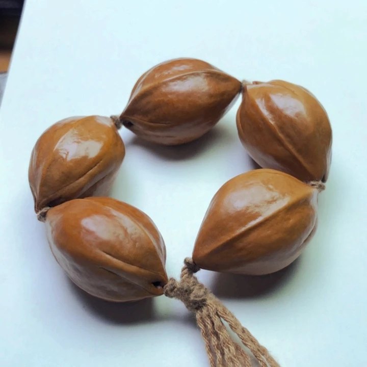 橄榄核把件梅林铁核