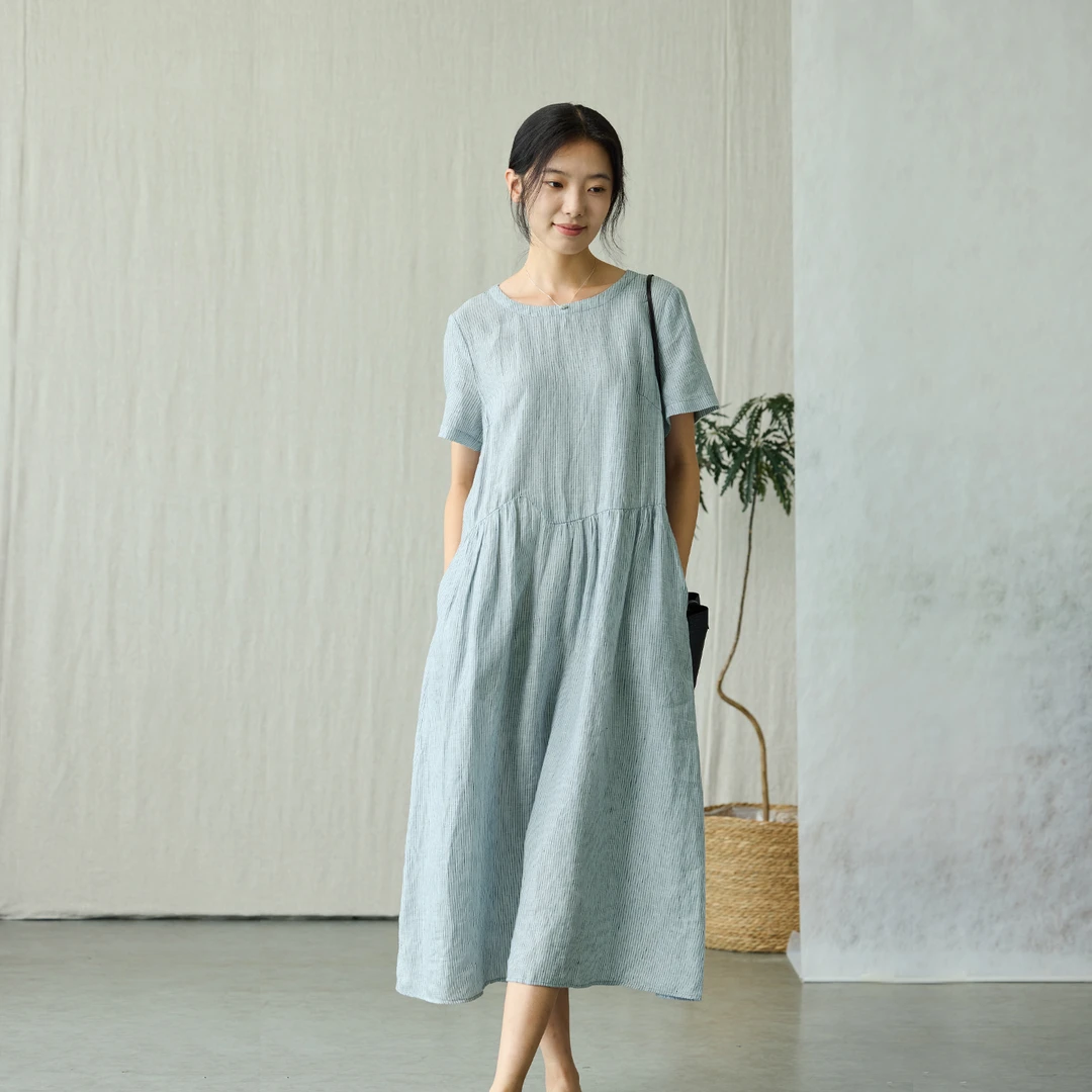 qtu蓝色连衣裙女高级感纯亚麻4577圆领短袖温柔好看夏日新款裙子
