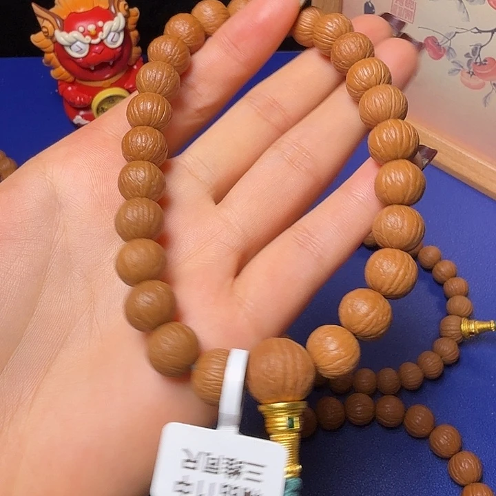 白***机猴头核桃吊坠凤羽
