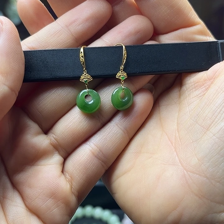 熠***晨和田玉18K金镶嵌耳饰