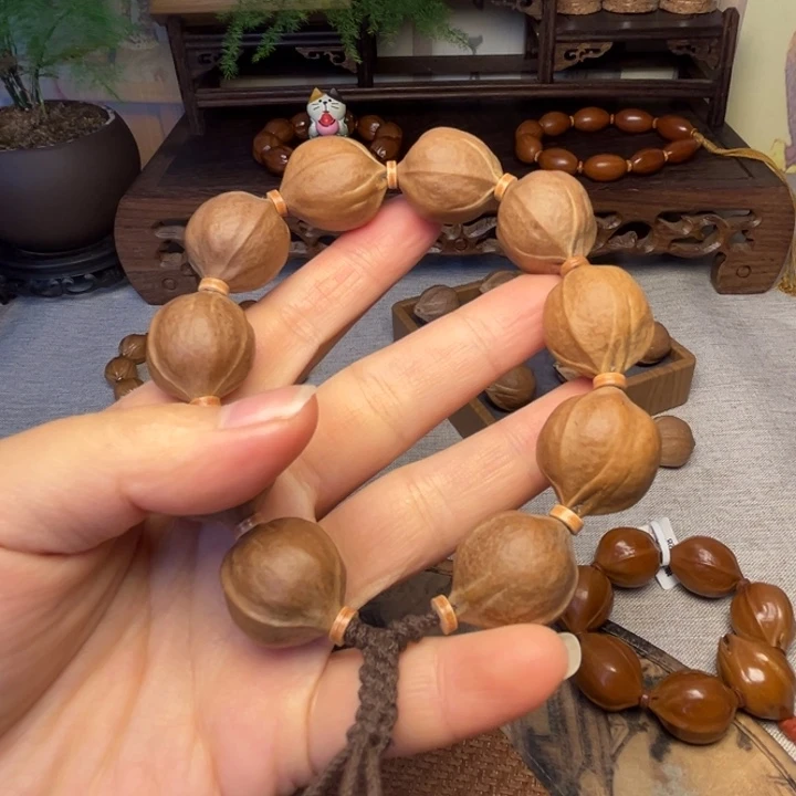 哲****橄榄核手串/手链梅林铁核2.1*2.5