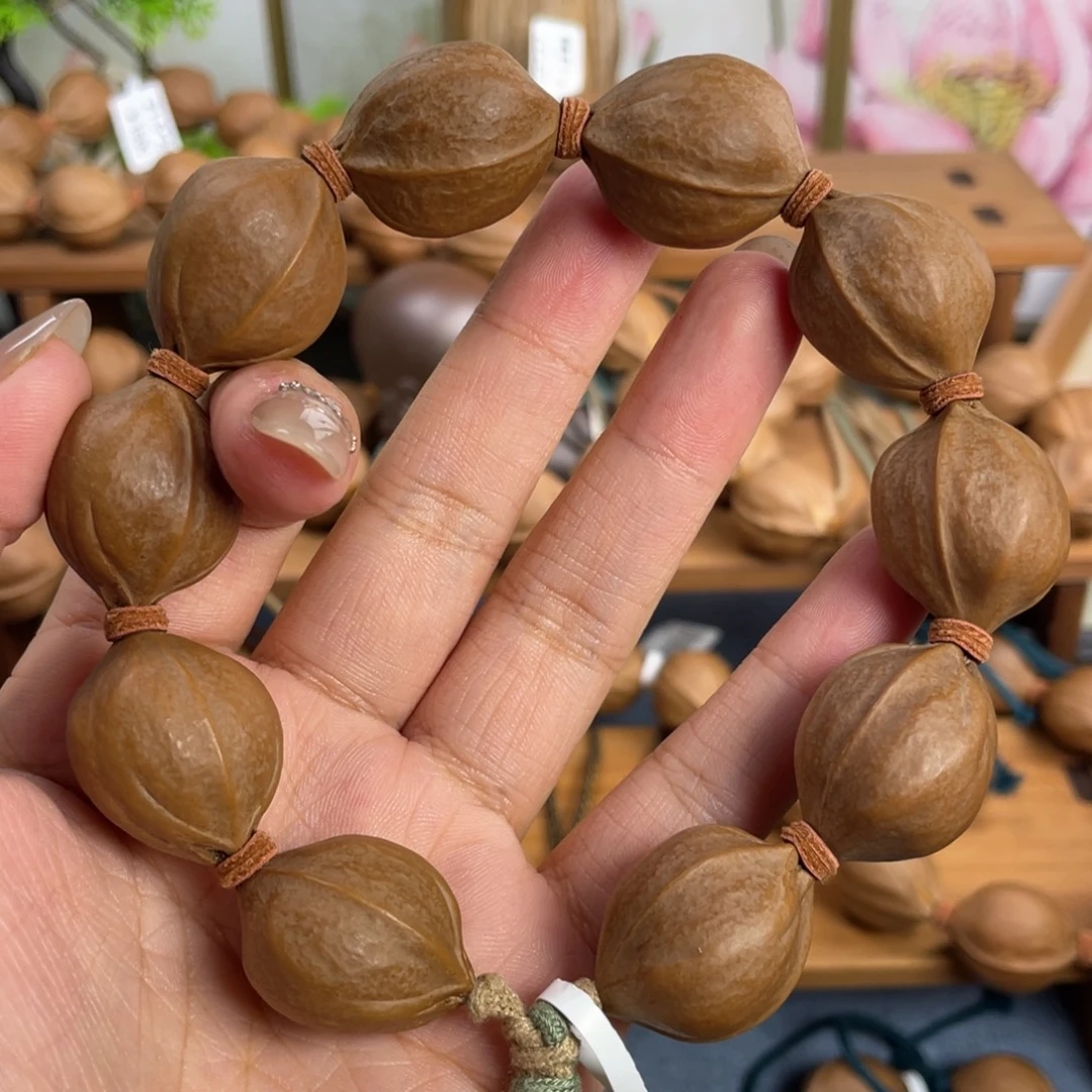 金***哥手串/手链橄榄核21*26梅林铁核