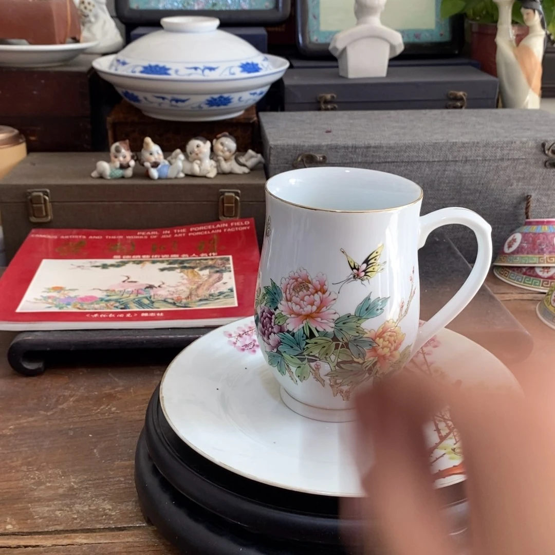 瓷片石*化蝶啤酒杯一只