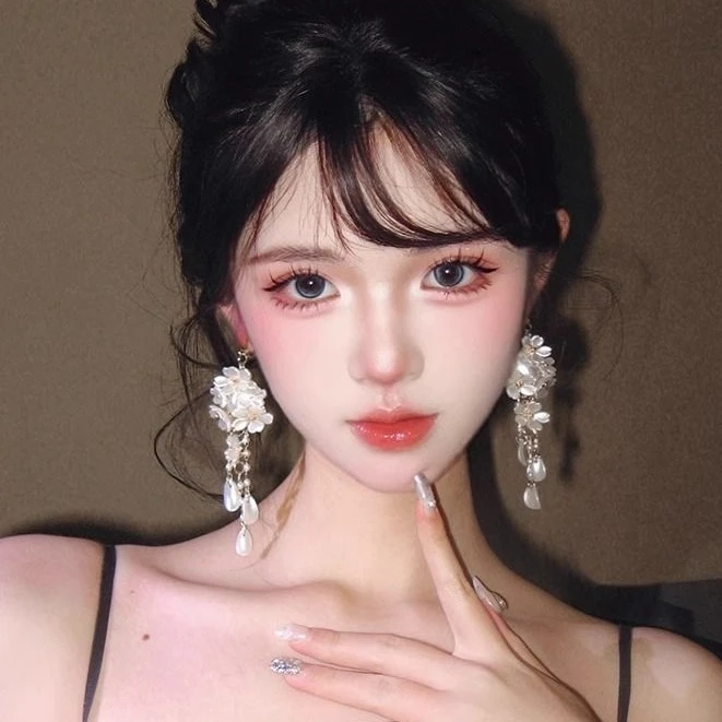 超仙复古白色花朵流苏耳环法式甜美度假风耳钉温柔氛围感耳饰