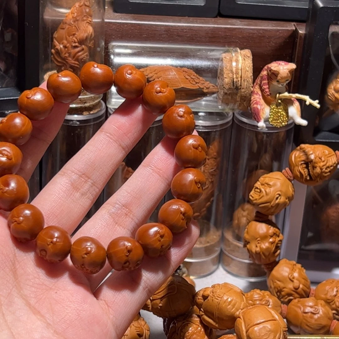 摩***ē手串/手链橄榄核百态