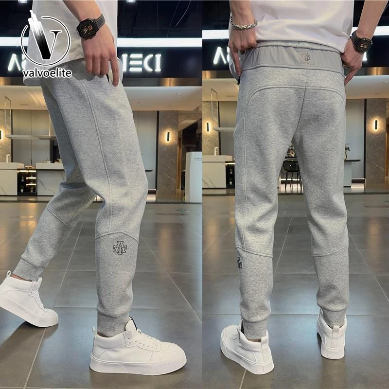 VALVOELITE简约拼接刺绣休闲裤男秋季新款时尚修身显瘦束脚运动裤