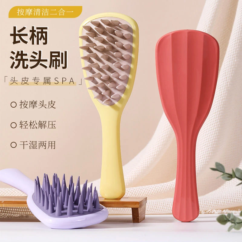 新品银杏叶洗头刷按摩器硅胶粗齿带手柄洗发梳长柄洗头按摩神器