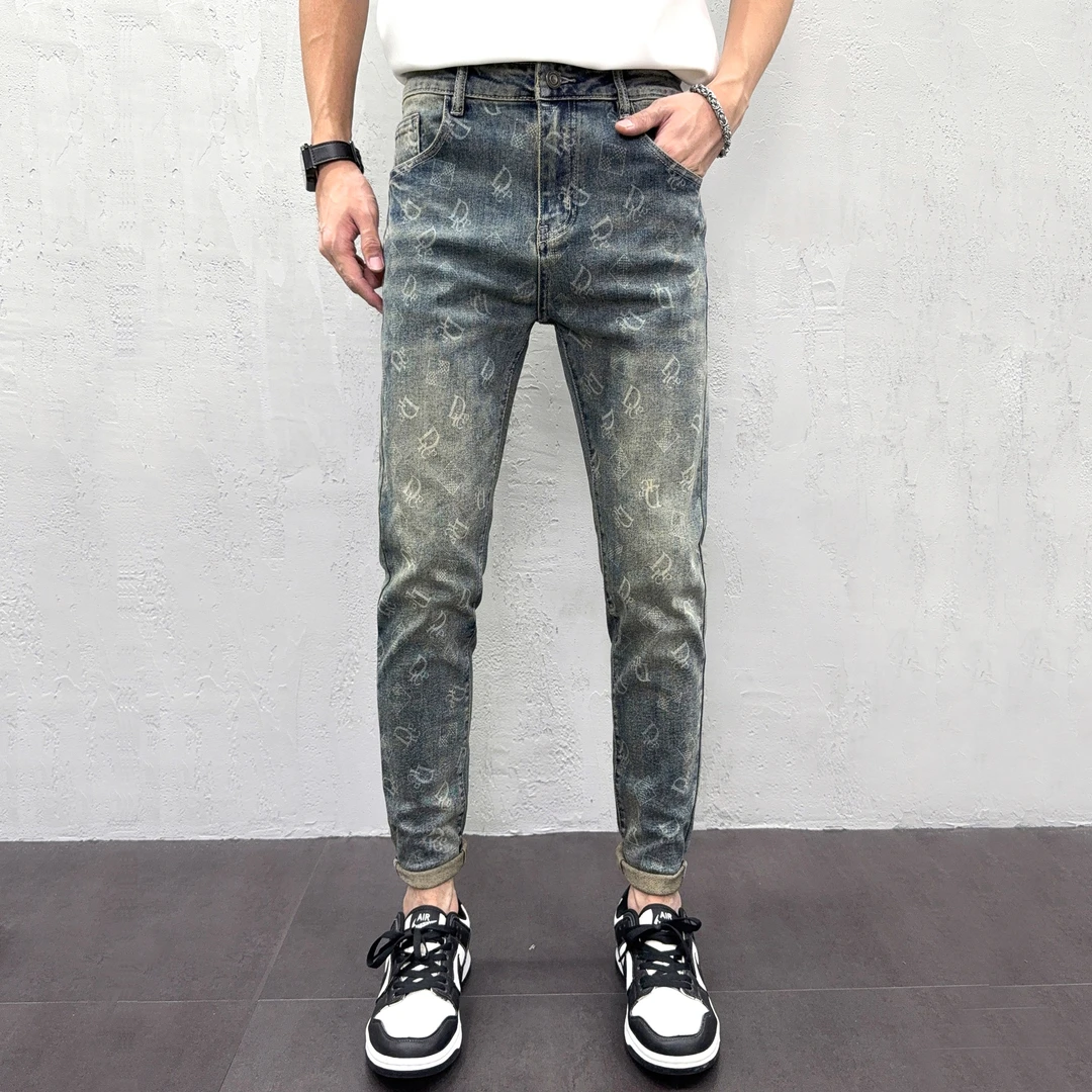 秋季男士牛仔裤爆款2025新款字母印花休闲潮流弹力欧货修身小脚裤