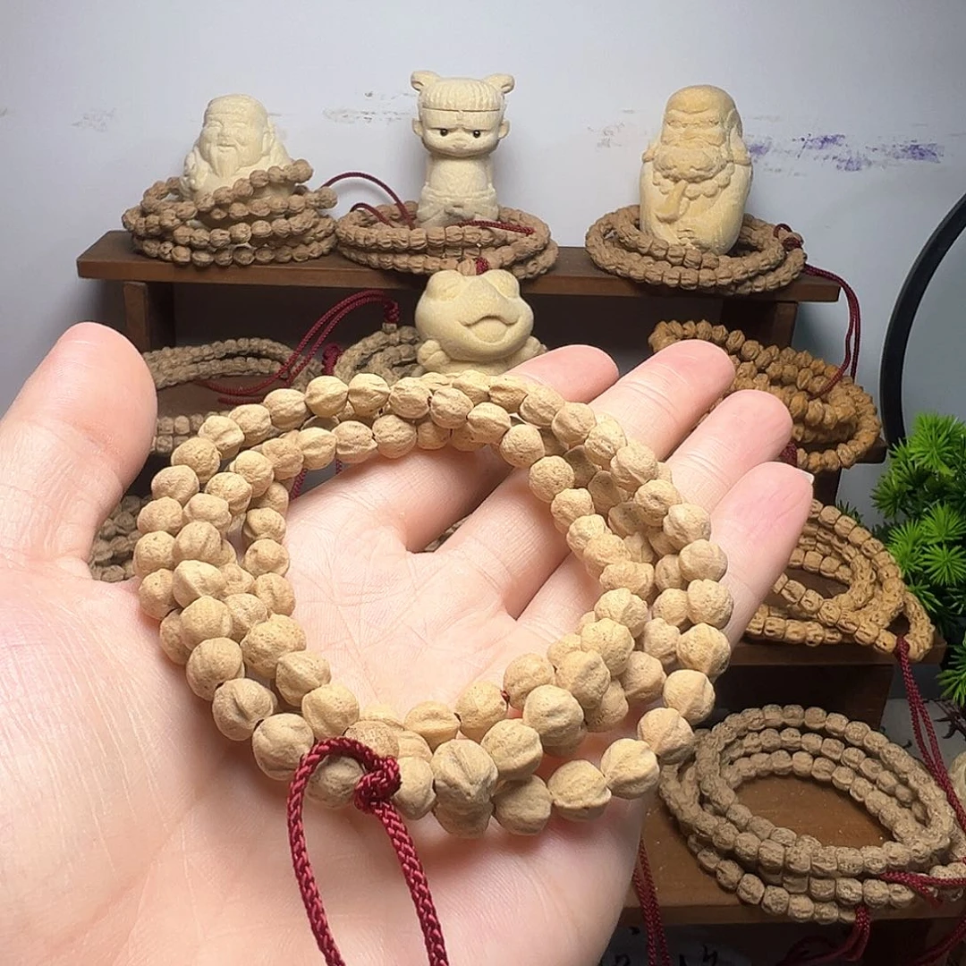 蹦***。柏香籽/百香籽吊坠