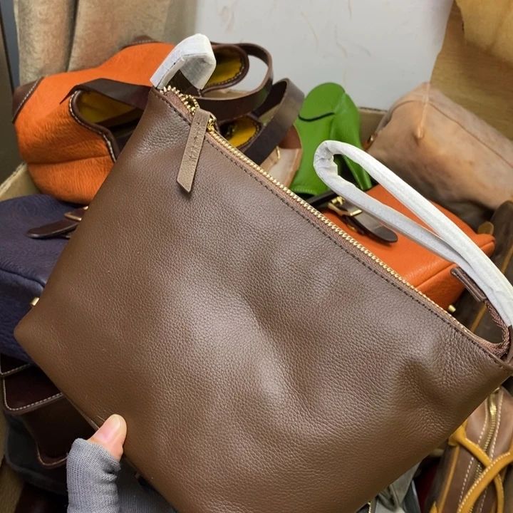 头层牛皮手拎包收纳