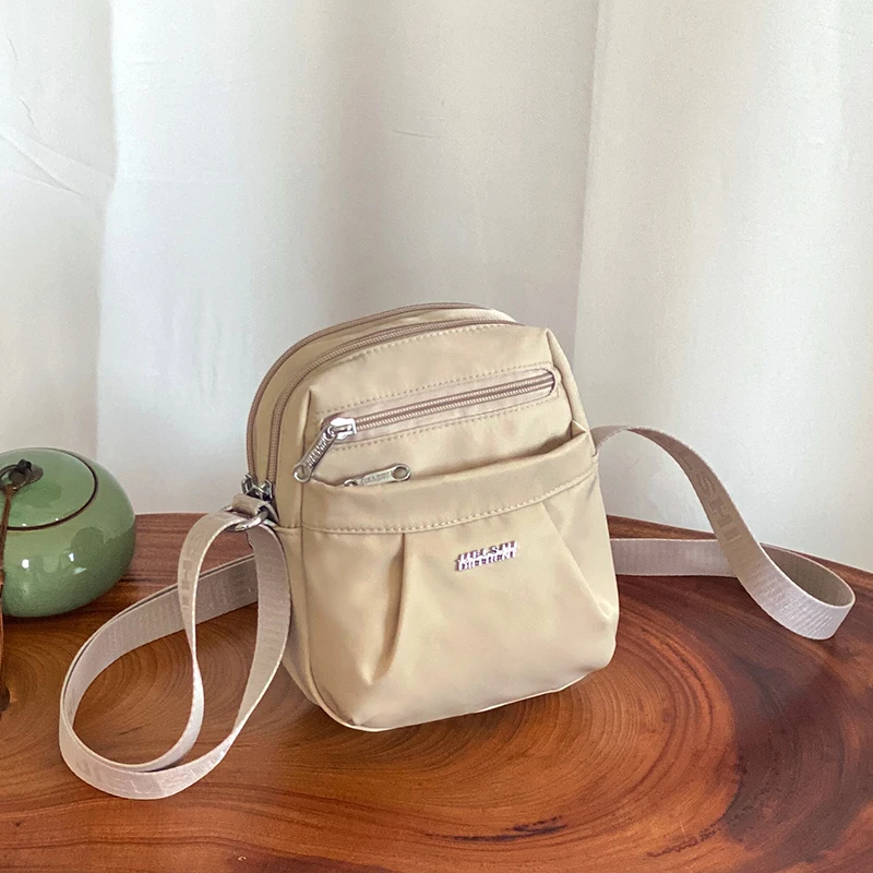 牛津布新款简约单肩包时尚小巧多层手机包尼龙防水斜挎百搭小包包