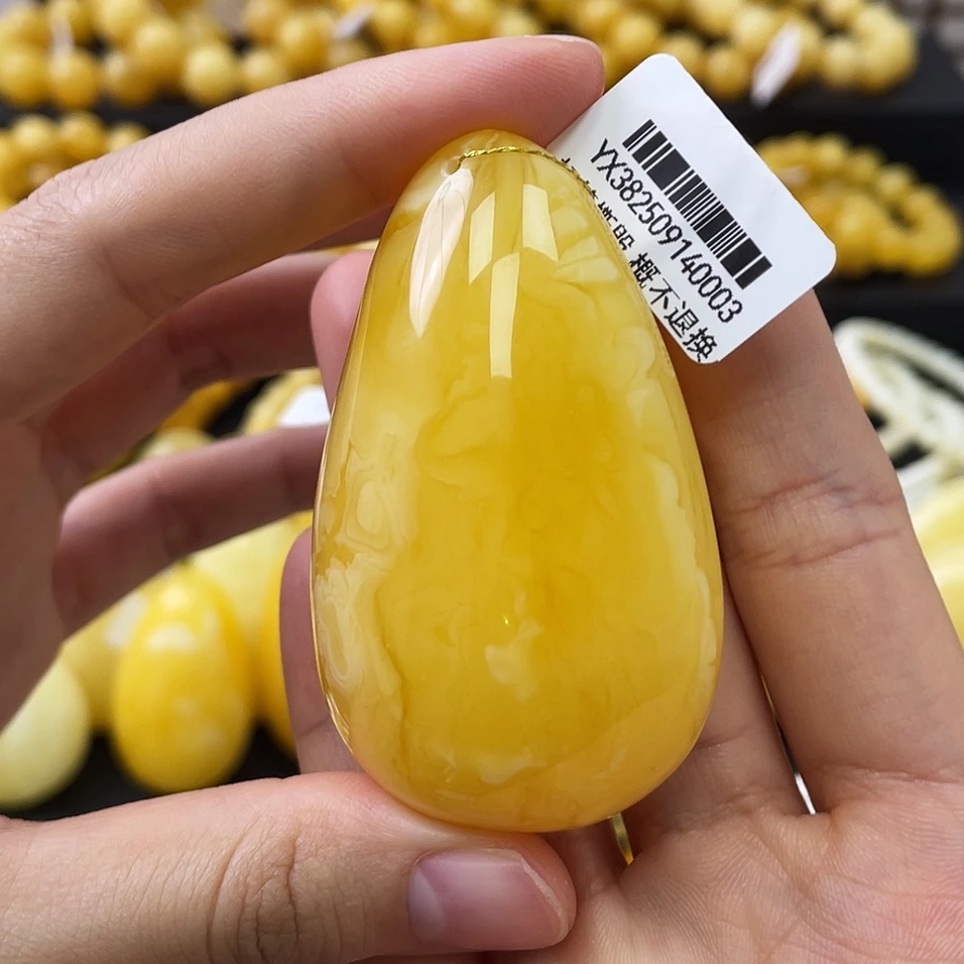 蜜蜡未镶嵌珠宝奇石兜***性62.2*39.4*22.8mm