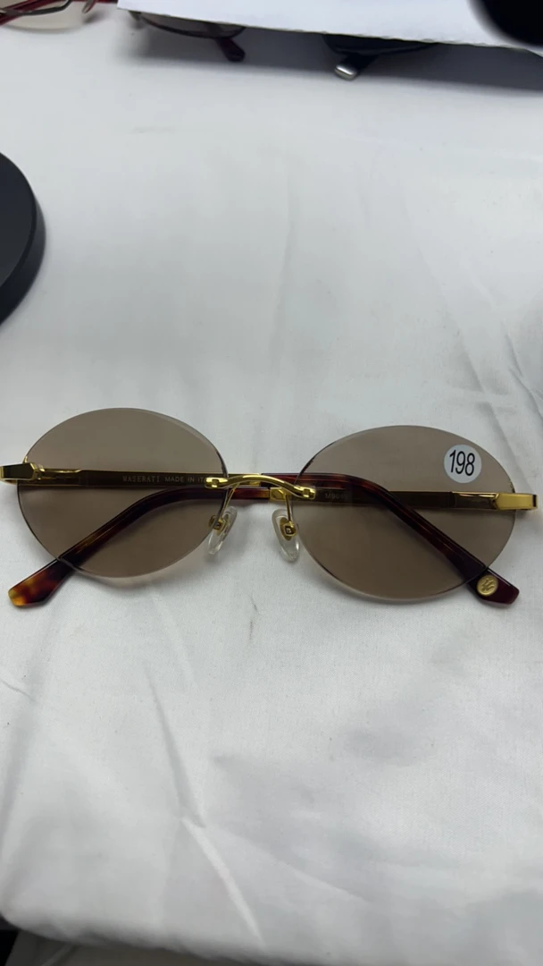 鸡蛋圆茶色石头眼镜