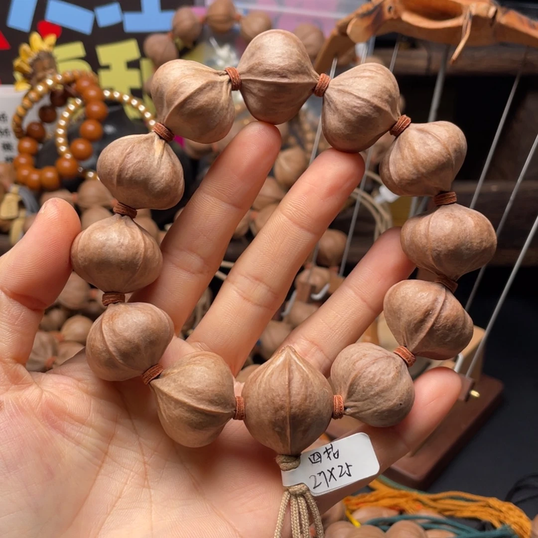 生***录橄榄核吊坠2725四花铁核