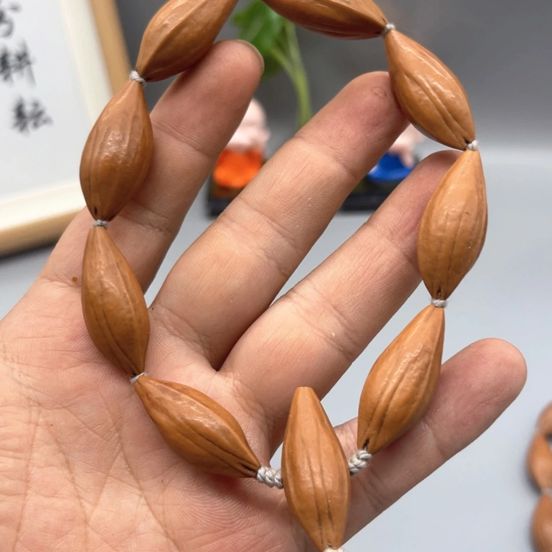 明***天手串/手链橄榄核大长腿