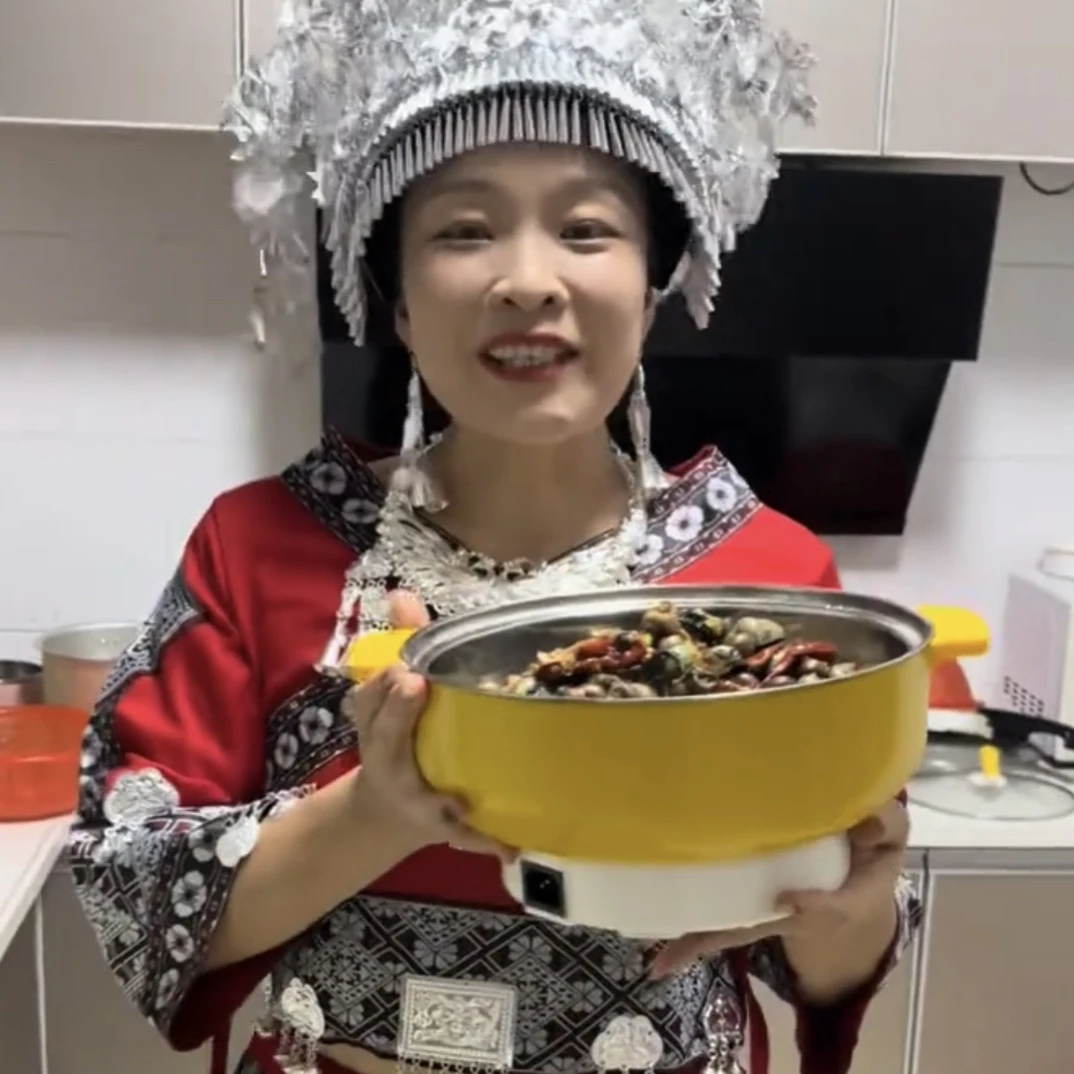 六姐家的麻辣炒石螺