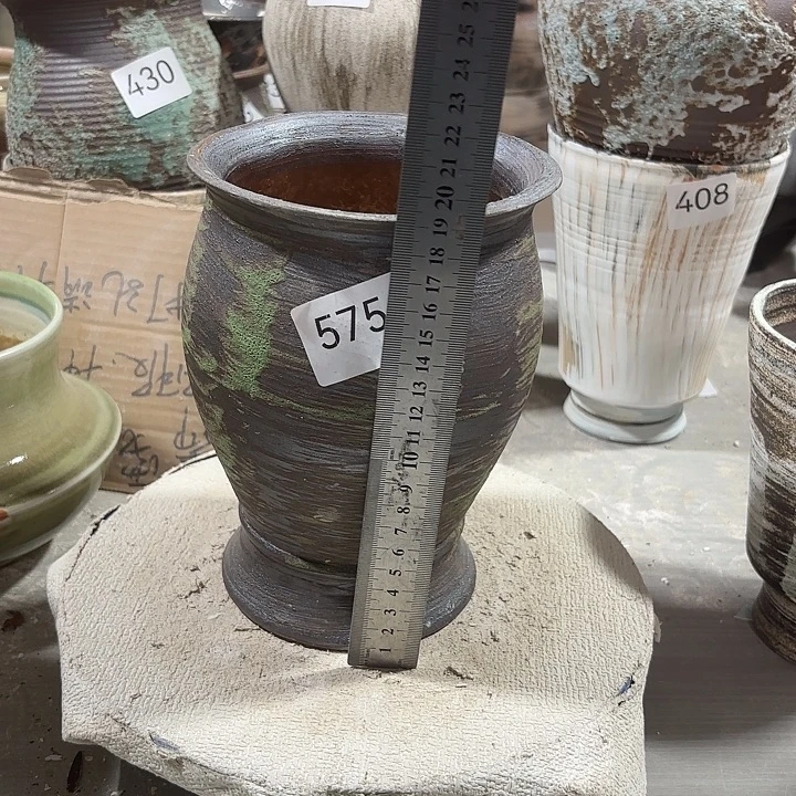 陶摆件高19口12有孔33