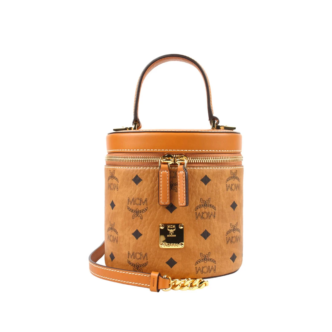 MCM人造革配牛皮革小号女士手提斜挎圆通便当包