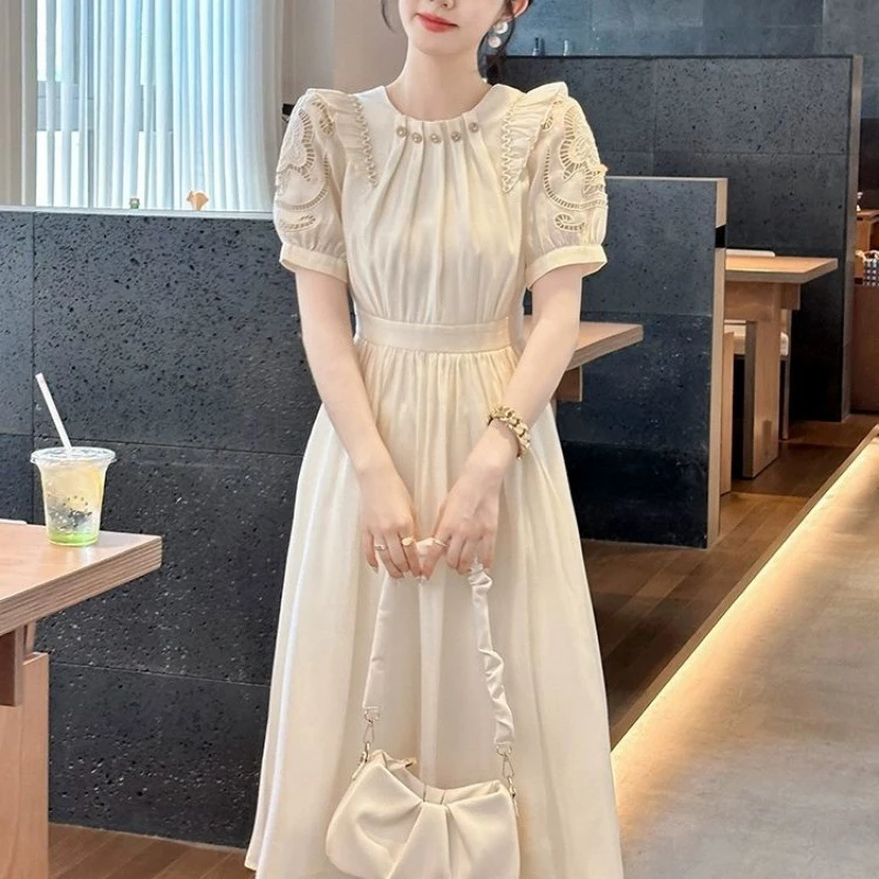 法式时尚精致连衣裙2025新款夏季短袖圆领高腰轻奢遮肚中长裙子