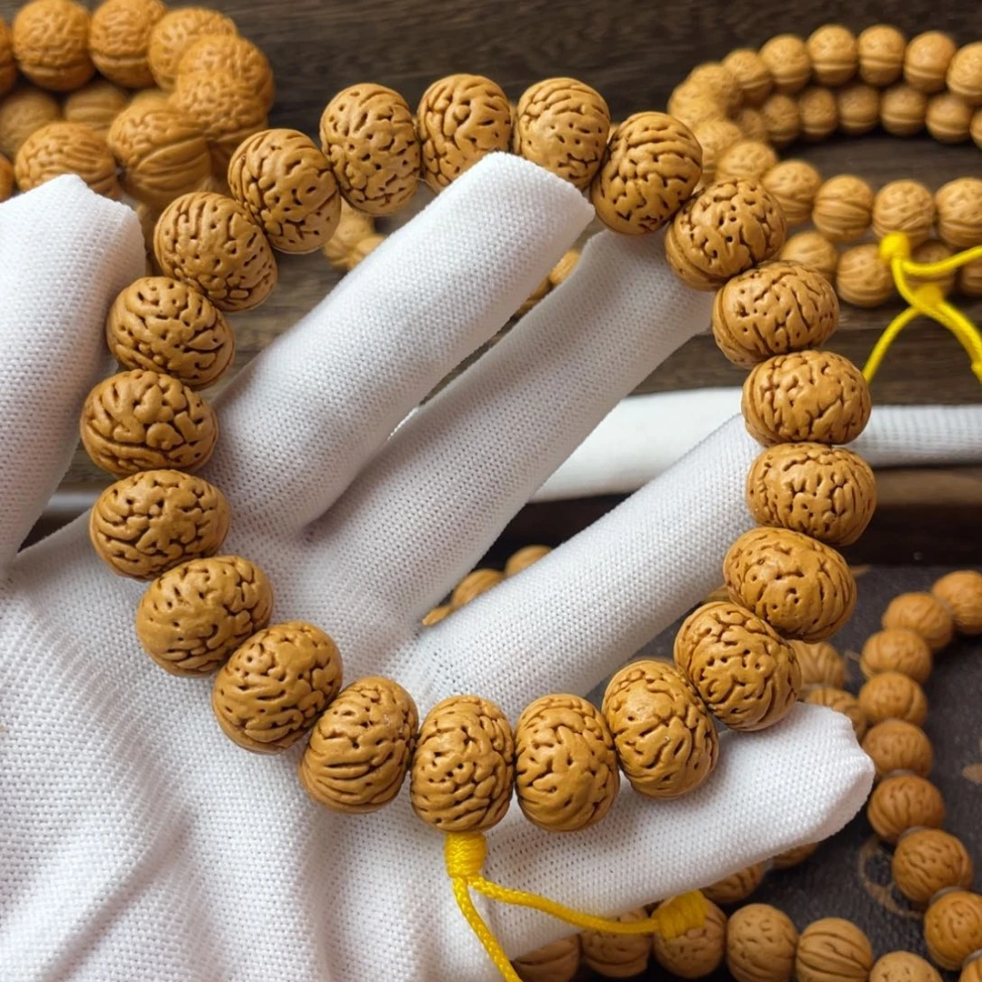 吊坠桃核树王纽扣手持